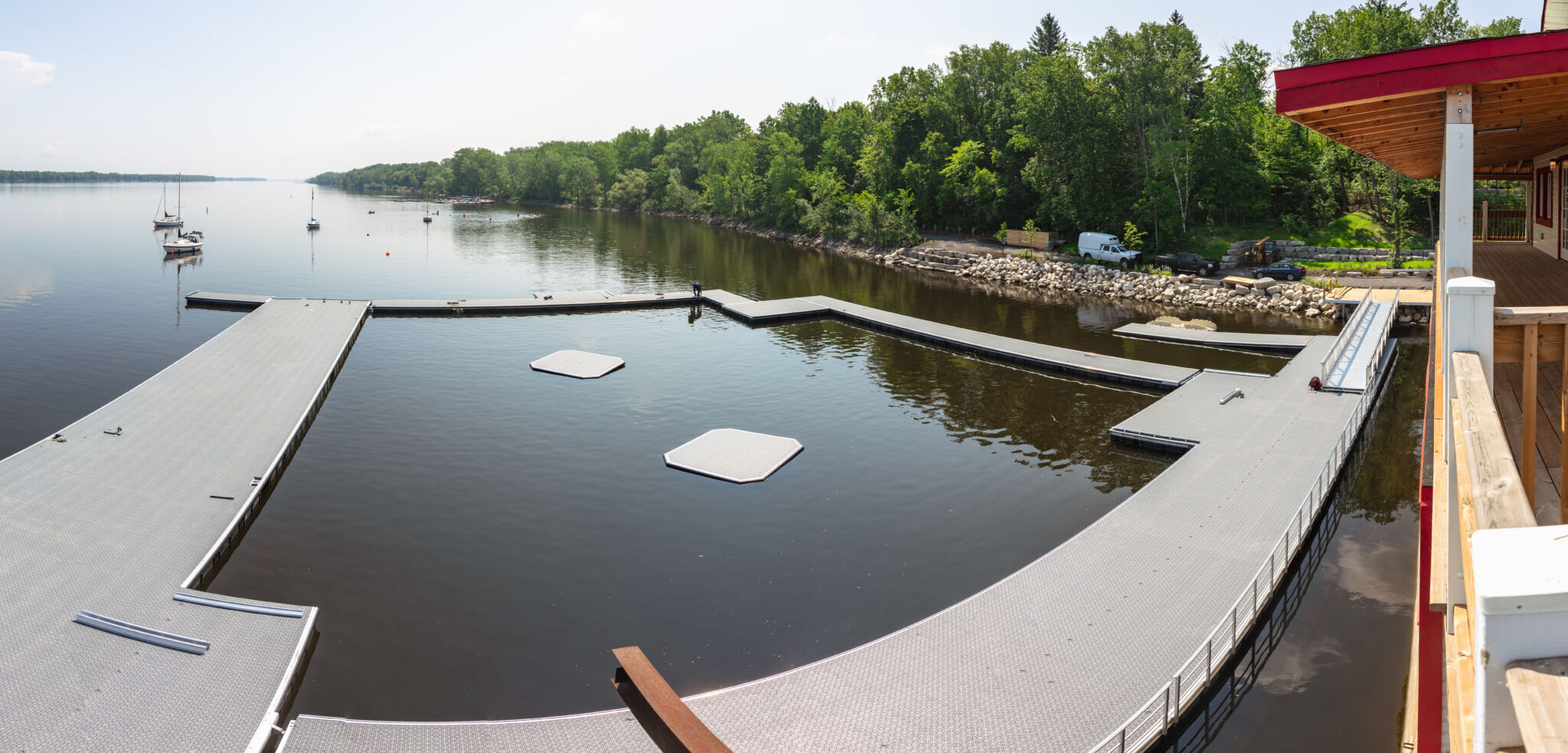 View of public dock providing access to the shoreline and swimming area