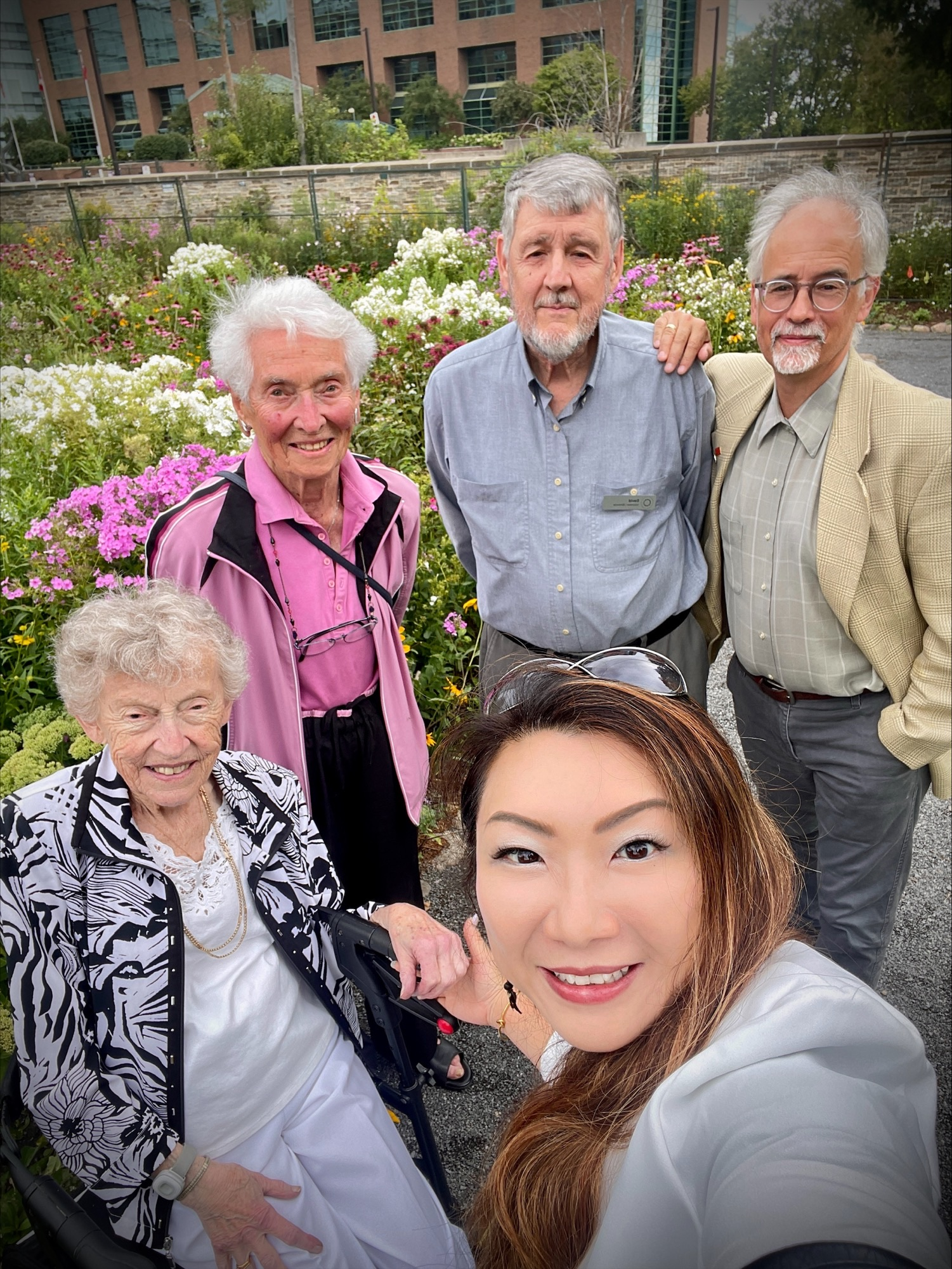 Selfie taken by Tina Liu with four volunteers.