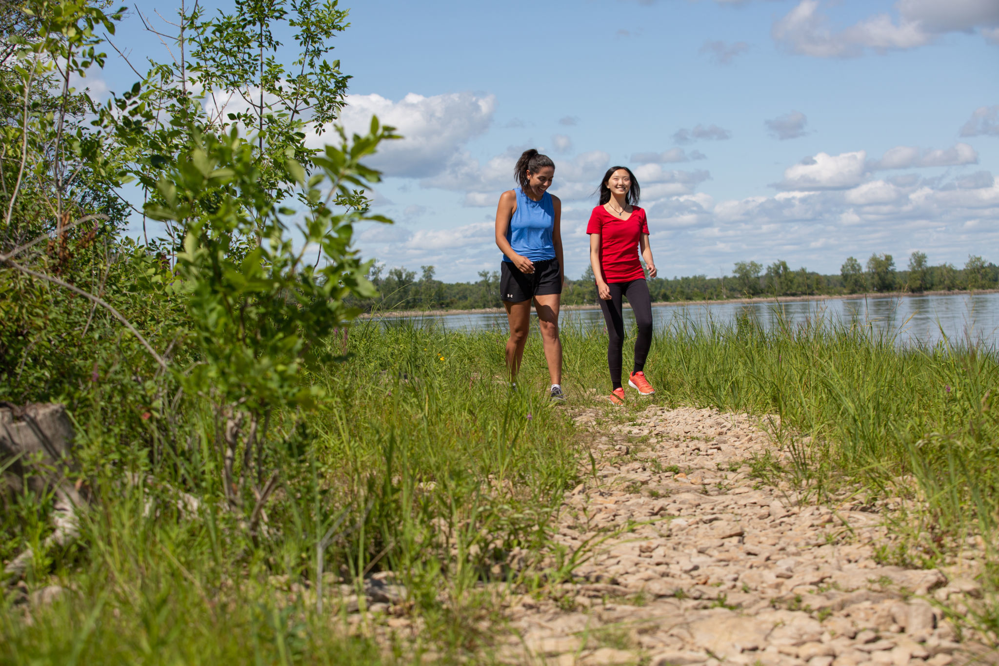 Two people walking on the Shoreline Trail.