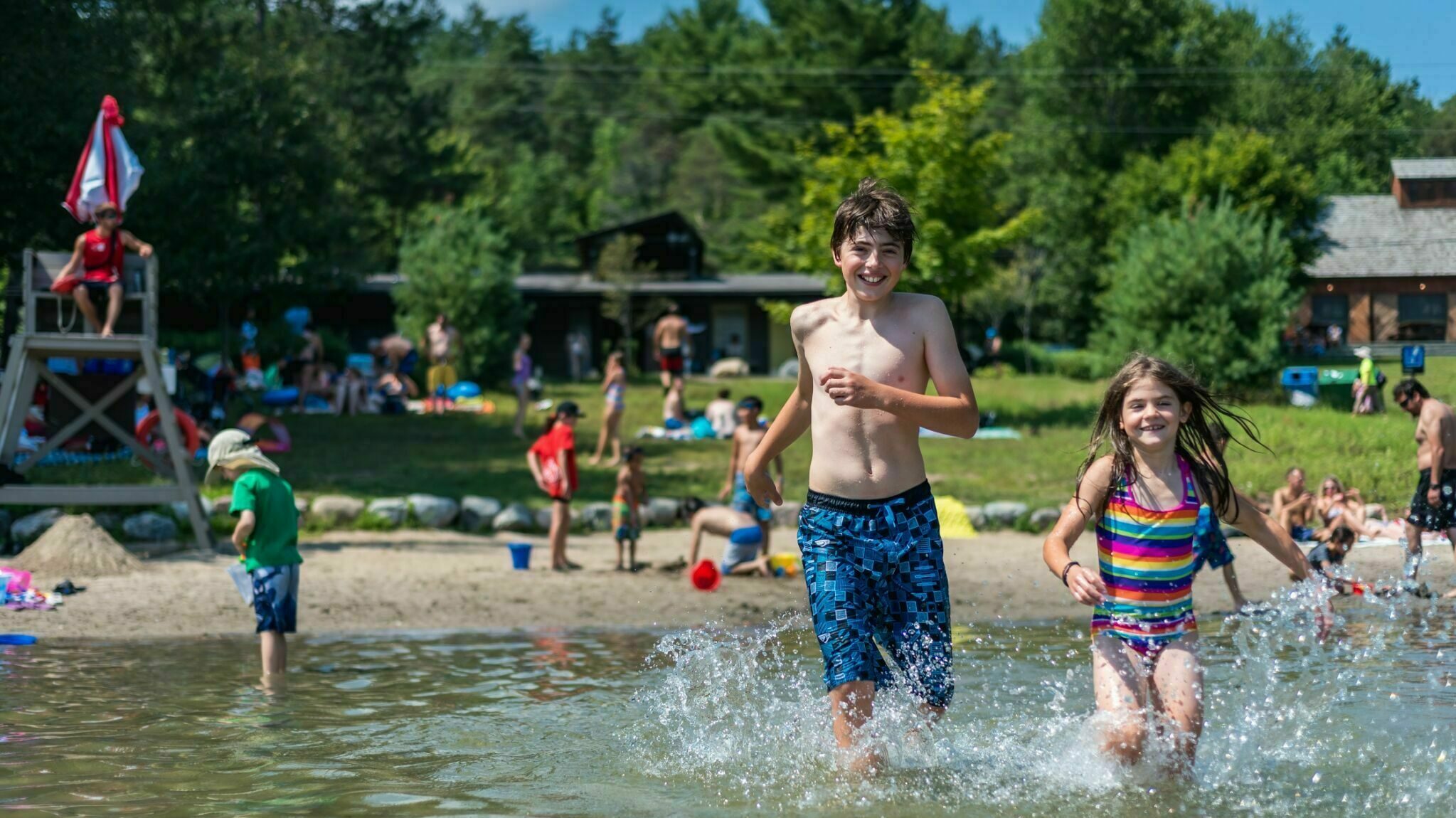 Swimmers at Breton Beach in Philippe Lake.