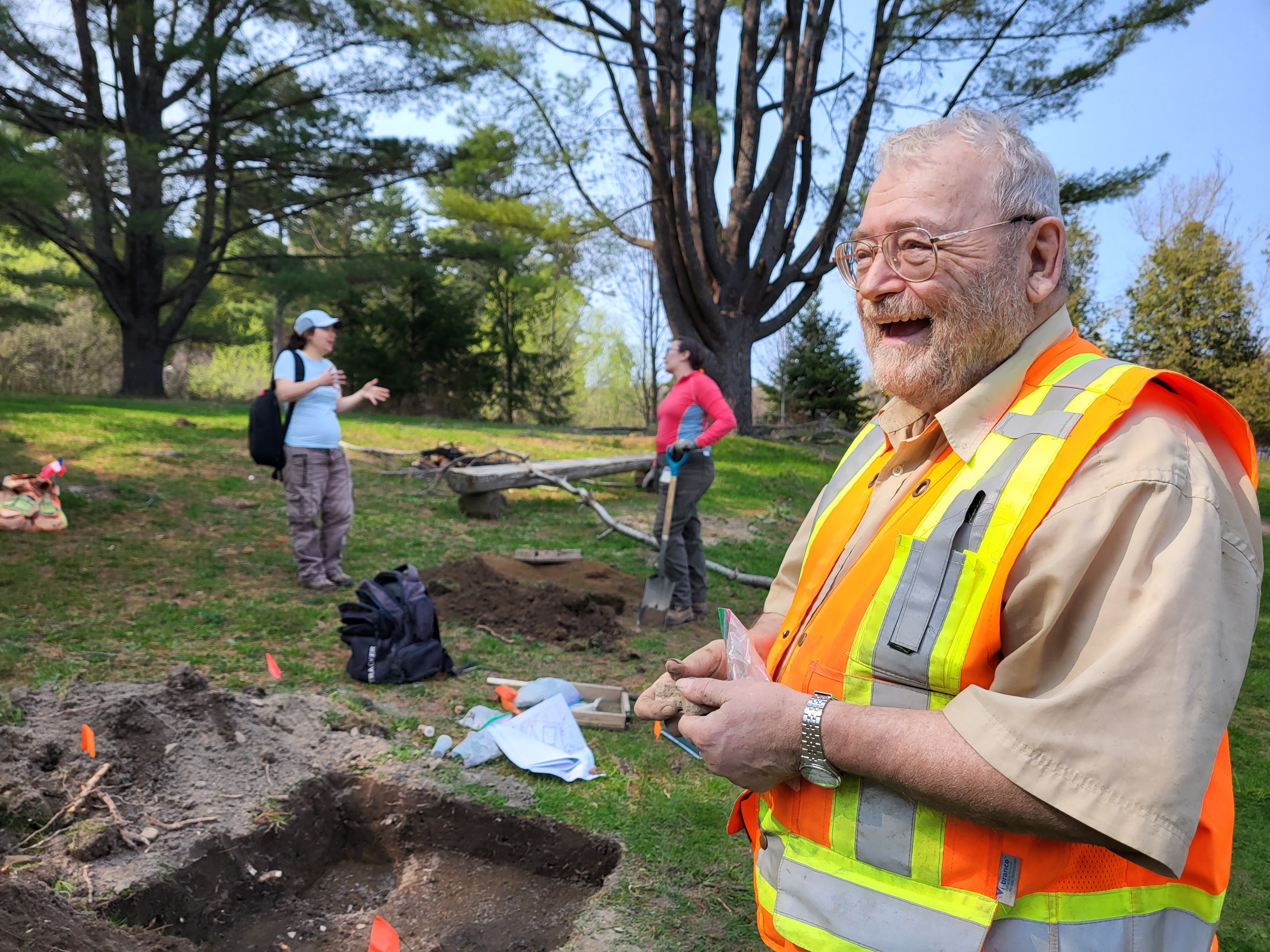 NCC archaeologist standing at dig site in Philippe Lake.