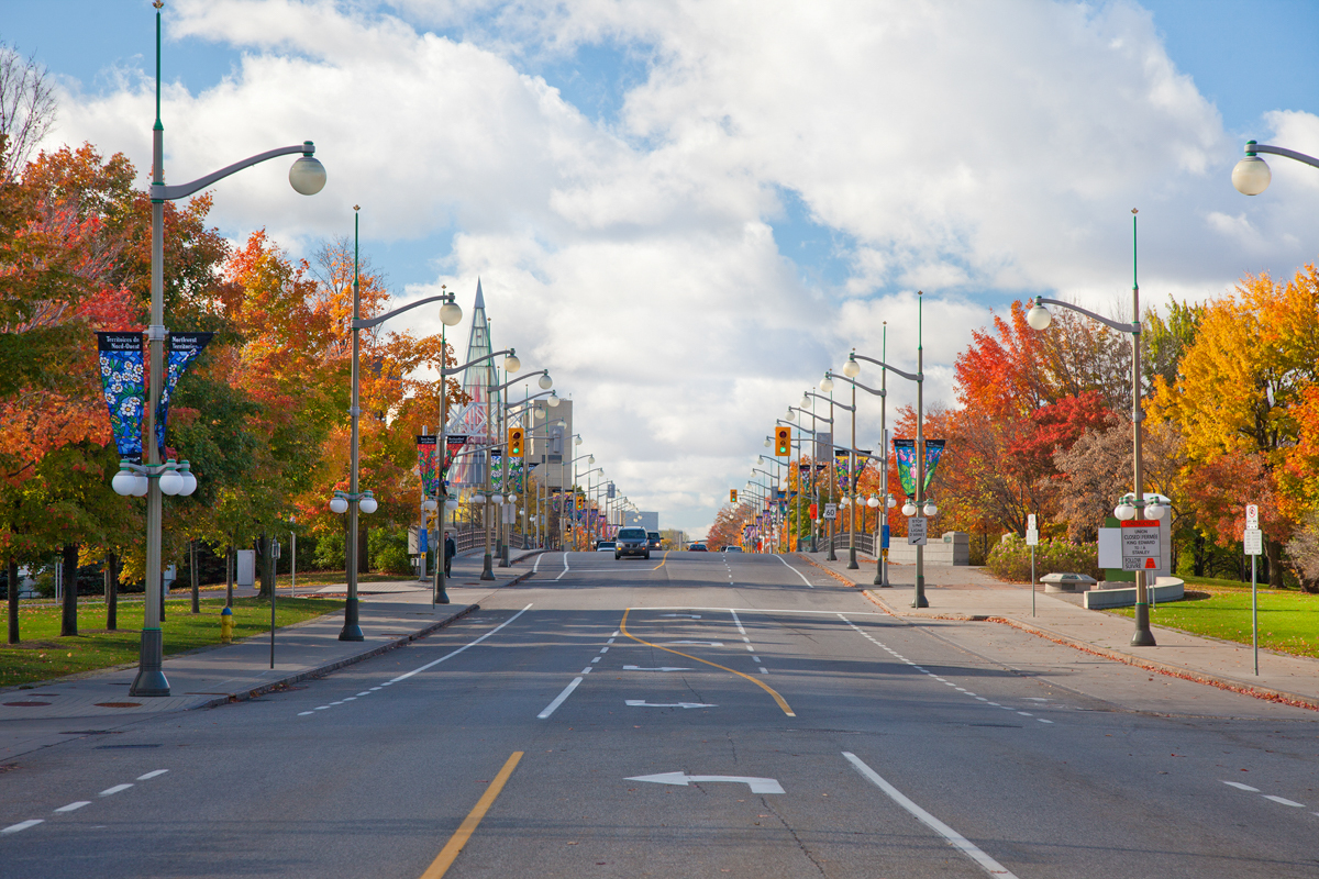 Sussex Drive eastbound in the fall, as seen from the intersection of Sussex Drive and Murray Street. The John G. Diefenbaker building is visible in the background.