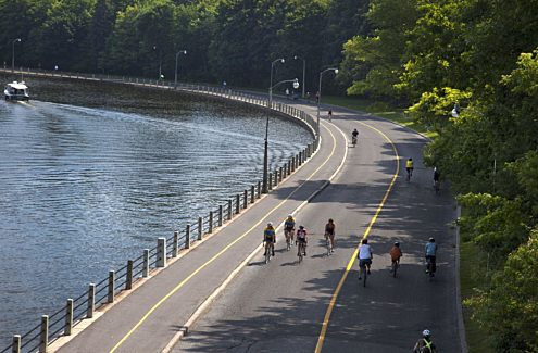 Cyclists on a car-free parkway closed to motor vehicles during Bikedays.