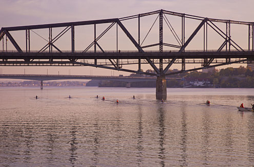 The Alexandra Bridge from the Ottawa River. In the background, the Macdonald-Cartier Bridge. Credit: NCC